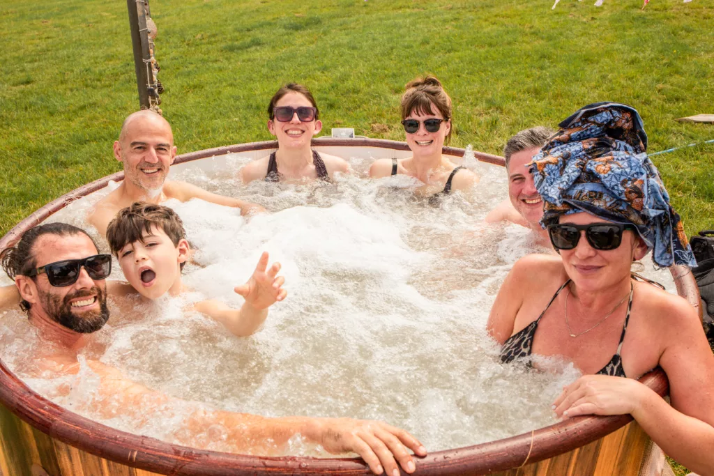 Happy people chilling in a hot tub