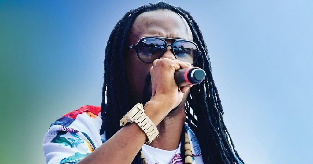 General Levy with sunglasses and a microphone